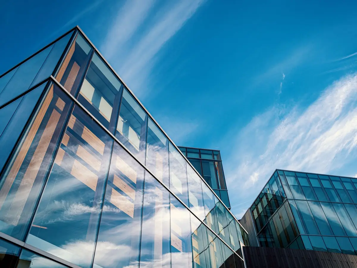 Glass office buildings against the sky